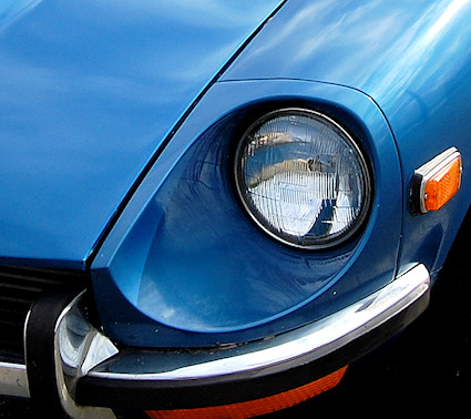 A photo of a Nissan Datsun 240Z Headlight on the front for the car