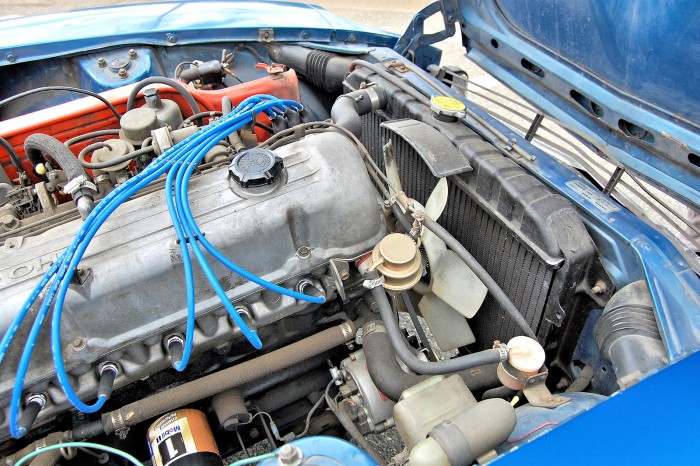 A photo of the Nissan Datsun 240Z Radiator in the engine compartment